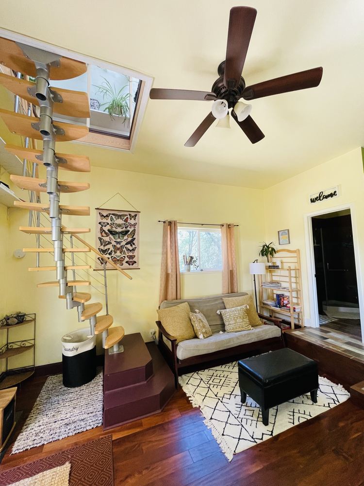 Cozy sitting area with spiral stairs